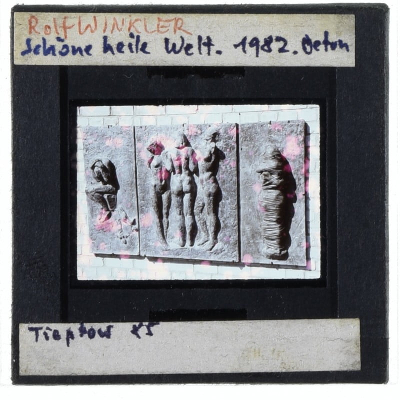 Dia mit Beschriftung und Farbflecken